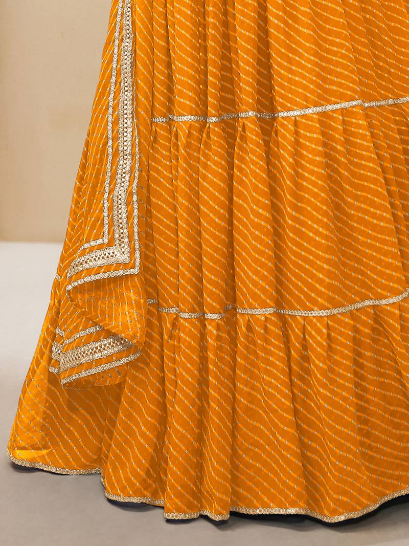 Enchanting Yellow Laheriya Print Georgette Designer Lehenga Choli