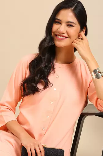 women's calf length round neck peach solid straight kurta