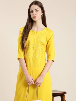 women's knee length round neck yellow solid straight kurta 1