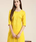 women's knee length round neck yellow solid straight kurta