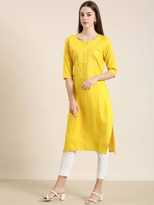 women's knee length round neck yellow solid straight kurta 4