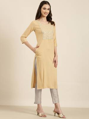 women's calf length round neck beige solid straight kurta 4