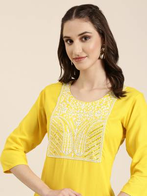 women's calf length round neck yellow solid straight kurta 1
