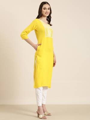 women's calf length round neck yellow solid straight kurta 4