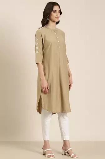 women's calf length round neck beige woven design straight kurta