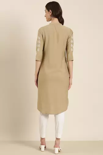 women's calf length round neck beige woven design straight kurta