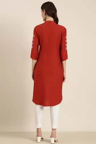 women's calf length round neck rust woven design straight kurta