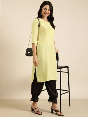 women's knee length round neck yellow solid straight kurta 1