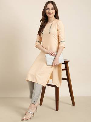 women's calf length round neck peach solid straight kurta 1