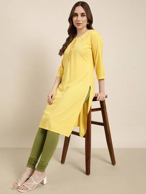 women's calf length round neck yellow solid straight kurta 1