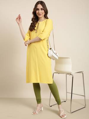 women's calf length round neck yellow solid straight kurta 1