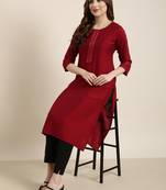 Showoff women's calf length round neck maroon solid straight kurta