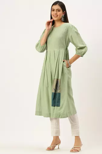 women's calf length round neck green solid a-line kurta