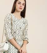 Showoff women's knee length round neck cream geometric straight kurta