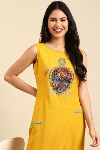 Showoff women's calf length round neck yellow solid straight kurta