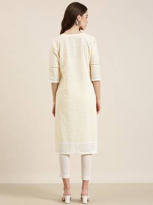 women's knee length round neck yellow embellished straight kurta 5