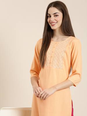 women's calf length round neck peach solid straight kurta 1