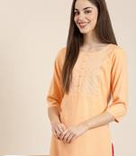 women's calf length round neck peach solid straight kurta