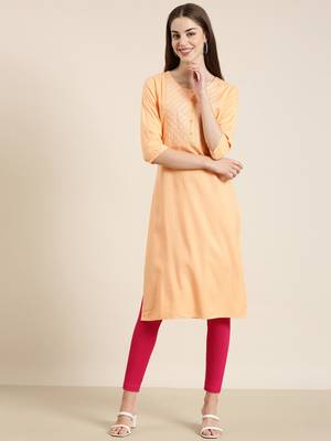 women's calf length round neck peach solid straight kurta 2
