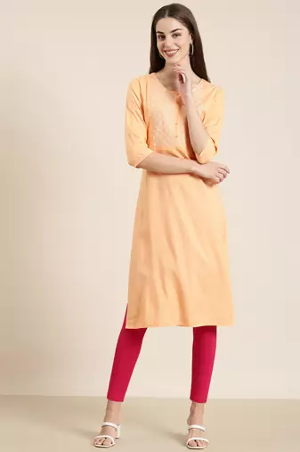 women's calf length round neck peach solid straight kurta