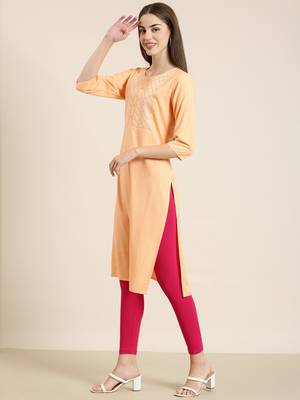 women's calf length round neck peach solid straight kurta 4