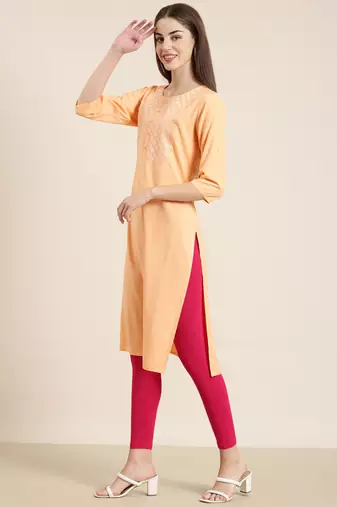 women's calf length round neck peach solid straight kurta