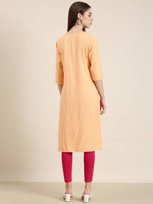women's calf length round neck peach solid straight kurta 5