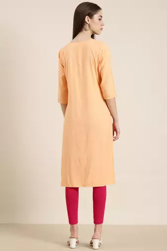 women's calf length round neck peach solid straight kurta