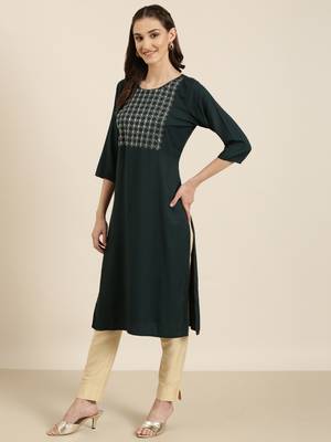 women's knee length round neck teal solid straight kurta 4