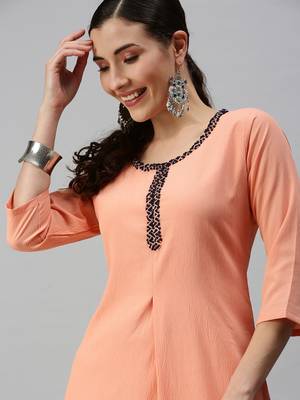 women's ankle length round neck peach solid straight kurta 1