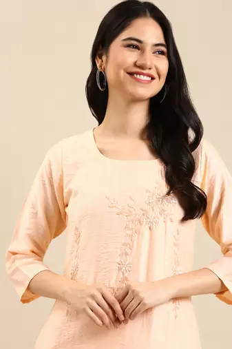 women's calf length round neck peach solid straight kurta