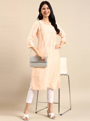 women's calf length round neck peach solid straight kurta 1