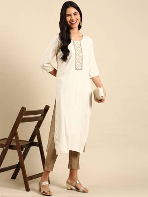 women's calf length round neck off white woven design straight kurta 1