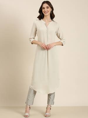 Showoff women's calf length mandarin collar beige solid straight kurta 1