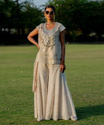 Gold tissue embroidered peplum top flared pant set 1