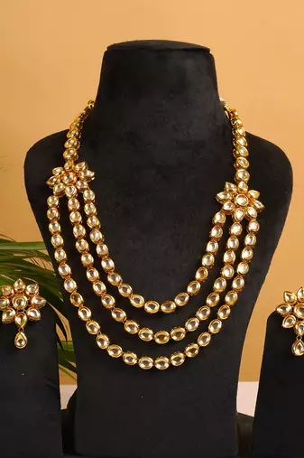 Two layered kundan flower embossed necklace set