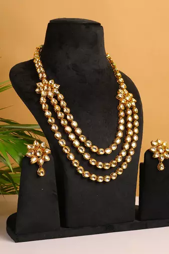 Two layered kundan flower embossed necklace set