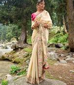 Cream zimmy choo silk embroidery work wedding saree with unstitched blouse