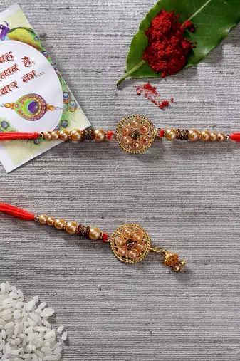 Nvr unisex set of 2 gold-toned stone-studded & beaded bhaiya bhabi rakhi with roli chawal