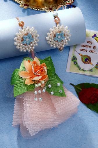  unisex set of 2 peach floral design pearl beaded bhaiya bhabi rakhi with roli chawal