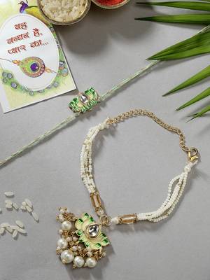 Nvr unisex set of 2 green lotus shape kundan-studded & beaded handcrafted wraparound rakhi set with roli chawal 1