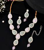 Gold plated nude pink and mint green stone studded jewellery set with maang tikka