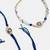 Nvr unisex set of 2 blue evil eye bhaiya bhabhi rakhi set with roli chawal