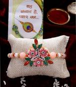  men pink floral shape stone-studdded & beaded rakhi with roli chawal