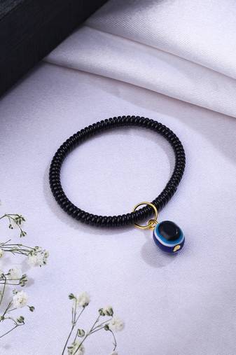  unisex black evil eye spring ring rakhi with roli chawal
