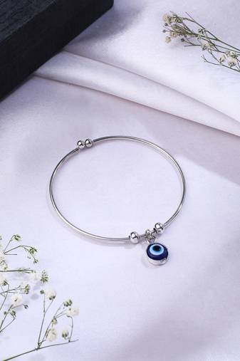 women silver-plated evil eye rakhi with roli chawal