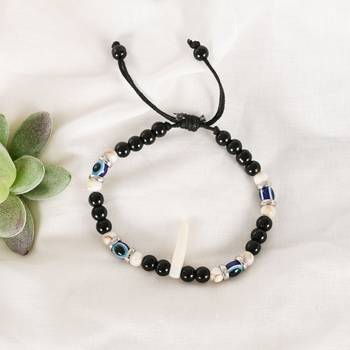  unisex black evil eye rakhi with roli chawal 2