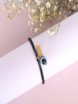  unisex black evil eye spring ring rakhi with roli chawal 2