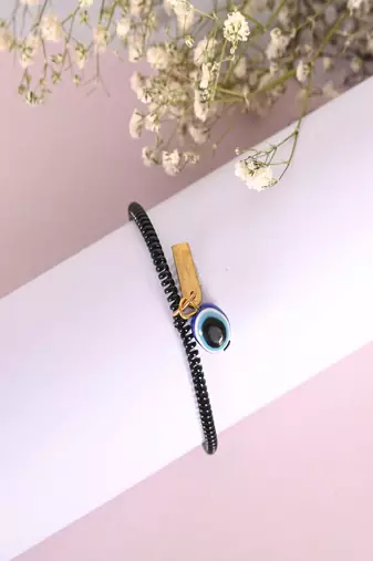  unisex black evil eye spring ring rakhi with roli chawal