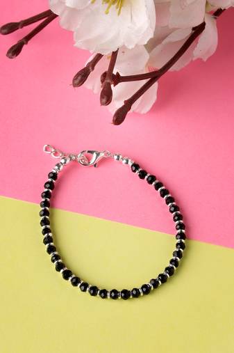  women silver plated black beaded adjustable rakhi with roli chawal